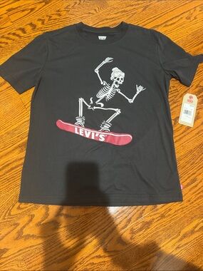 Levi's Black Tee with White Skeleton and Red Skateboard Graphic